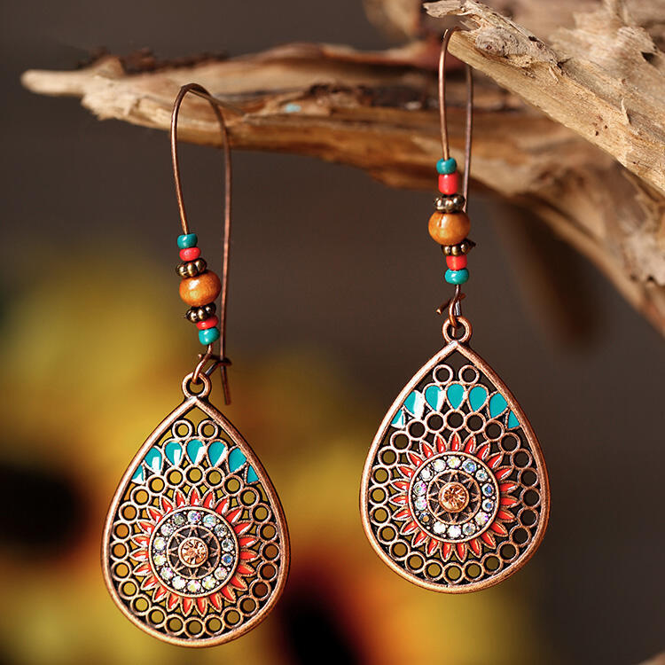 Bohemian hollow drop-shaped alloy dripping long earrings